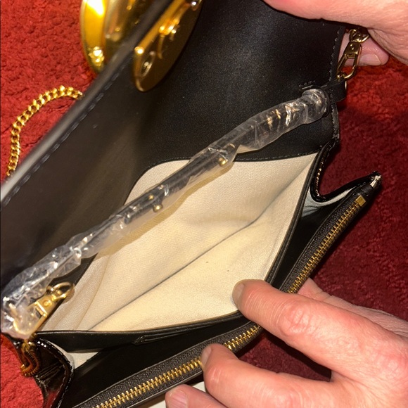 Elegant Black and Gold Clutch with Chain by Ted Baker - Picture 9 of 10